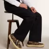 Herrenmodell Space-Star aus Ponyfell mit Leopardenmuster, schwarzem Stern und Absatz