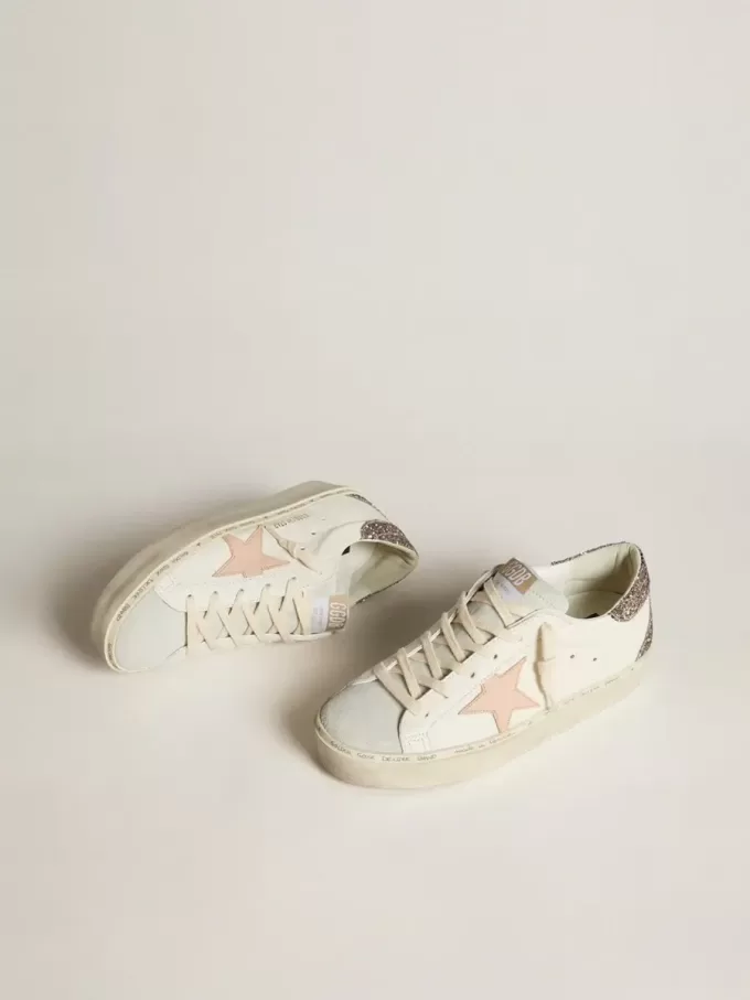 Hi Star aus weißem Nappaleder mit rosa Lederstern und glitzernder Fersenlasche