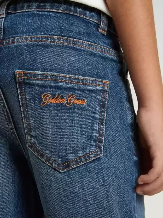 Jeans für Jungen mit offener Kante und Stickerei