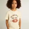 Jungen-T-Shirt in Used-Weiß mit mehrfarbigem Schriftzug
