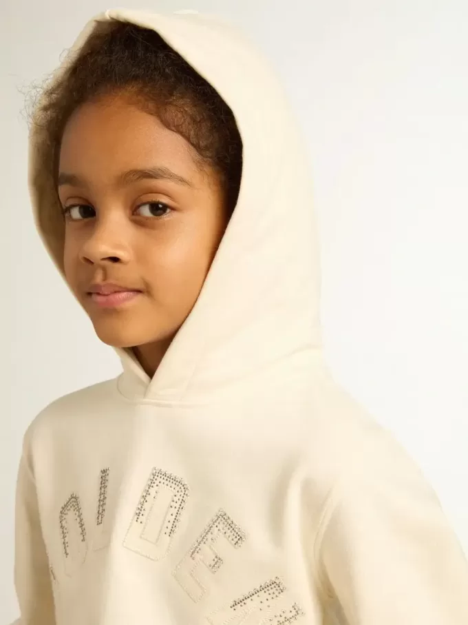 Kapuzensweatshirt in Altweiß mit Aufnähern Kapuzensweatshirt in Altweiß mit Aufnähern