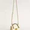 Kleine Venezia-Tasche aus butterfarbenem Leder mit geflochtenem Schal