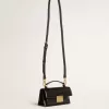 Kleine Venezia-Tasche aus schwarzem Leder mit Golddetails