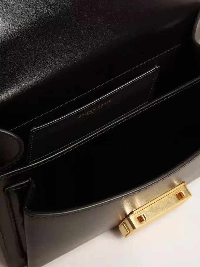Kleine Venezia-Tasche aus schwarzem Leder mit Golddetails