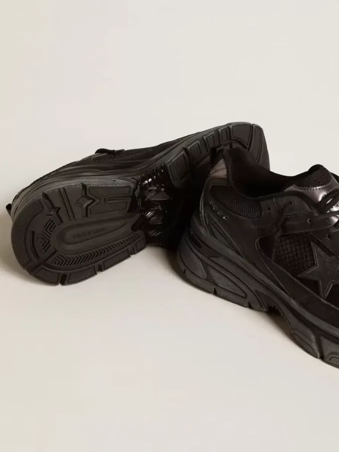 Lightstar für Damen mit schwarzem Obermaterial aus Leder und Mesh und schwarzem Stern