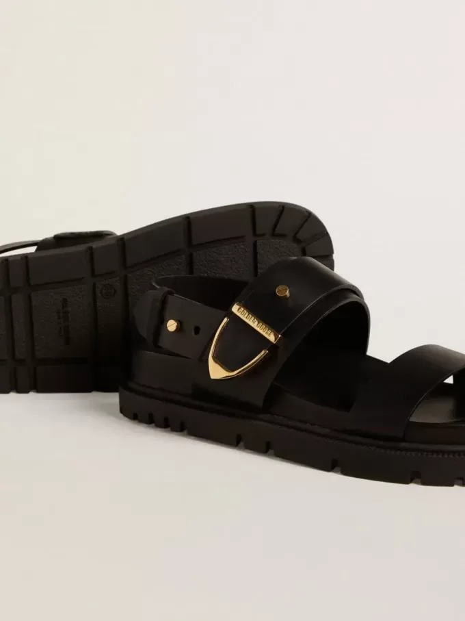 Lucy Sandale für Damen aus glänzendem schwarzem Leder mit goldener Metallschnalle