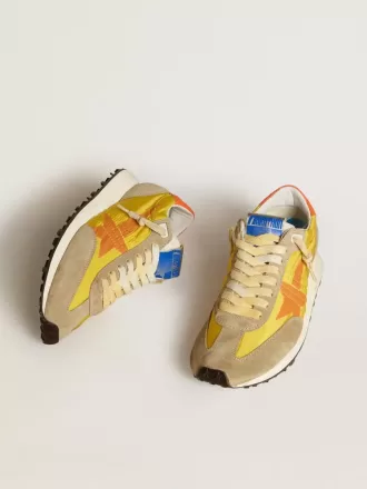 Marathon für Damen mit gelbem Nylon-Obermaterial und orangefarbenem Stern Marathon für Damen mit gelbem Nylon-Obermaterial und orangefarbenem Stern
