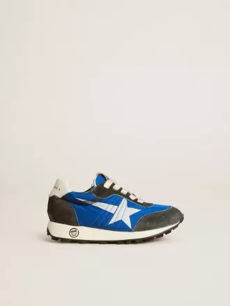 Marathon Young aus blauem Nylon mit aufgedrucktem Stern und Lederlasche an der Ferse Marathon Young aus blauem Nylon mit aufgedrucktem Stern und Lederlasche an der Ferse