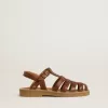 Maxime Young Sandalen aus braunem Leder Maxime Young Sandalen aus braunem Leder