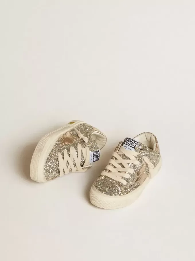 May Junior in Platin-Glitzer mit metallischem Lederstern und Fersenlasche