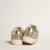 May Junior in Platin-Glitzer mit metallischem Lederstern und Fersenlasche
