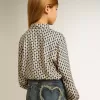Mädchen-Poloshirt mit geometrischem Print Mädchen-Poloshirt mit geometrischem Print