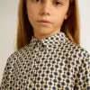 Mädchen-Poloshirt mit geometrischem Print Mädchen-Poloshirt mit geometrischem Print
