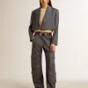 Mesh-Strickoberteil mit Pailletten und kontrastierenden Details Mesh-Strickoberteil mit Pailletten und kontrastierenden Details