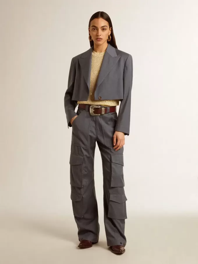 Mesh-Strickoberteil mit Pailletten und kontrastierenden Details Mesh-Strickoberteil mit Pailletten und kontrastierenden Details