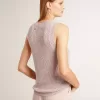 Mesh-Strickoberteil mit Pailletten und kontrastierenden Details Mesh-Strickoberteil mit Pailletten und kontrastierenden Details