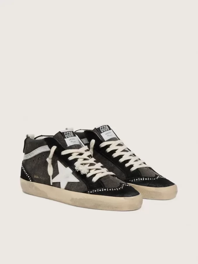 Mid Star LTD aus schwarzem Denim mit Wildledereinsätzen und Swarovski-Kristallen