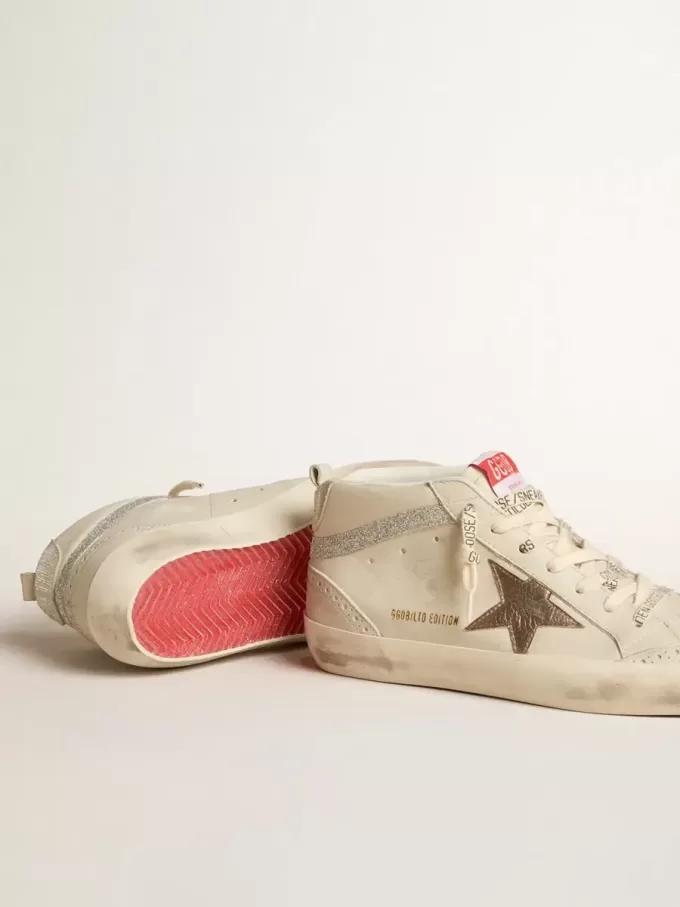 Mid Star LTD für Damen mit bronzefarbenem Lederstern und Swarovski-Kristallblitz Mid Star LTD für Damen mit bronzefarbenem Lederstern und Swarovski-Kristallblitz