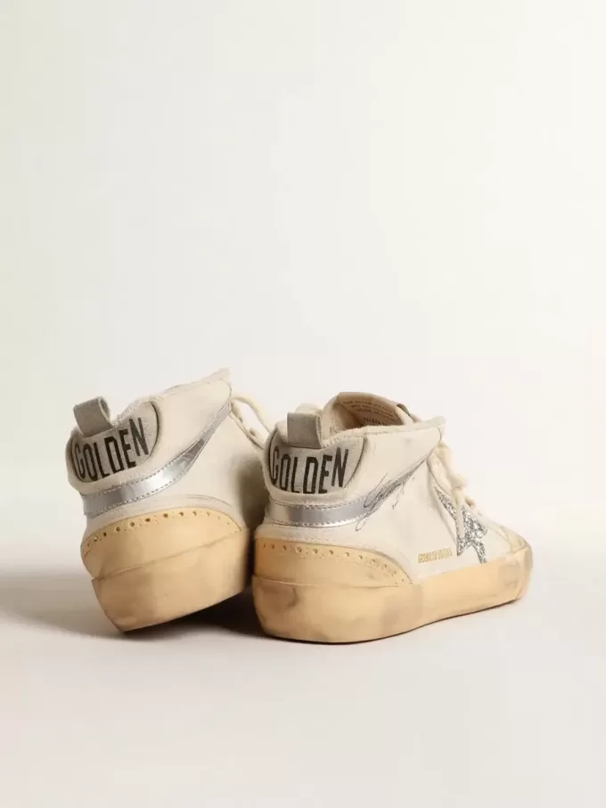 Mid Star LTD mit Glitzerstern und metallischem Lederbesatz