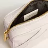 Mini Star Bag aus butterweißem Leder mit Ton-in-Ton-Stern