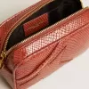 Mini Star Bag aus rostfarbenem Leder mit Schlangenprint