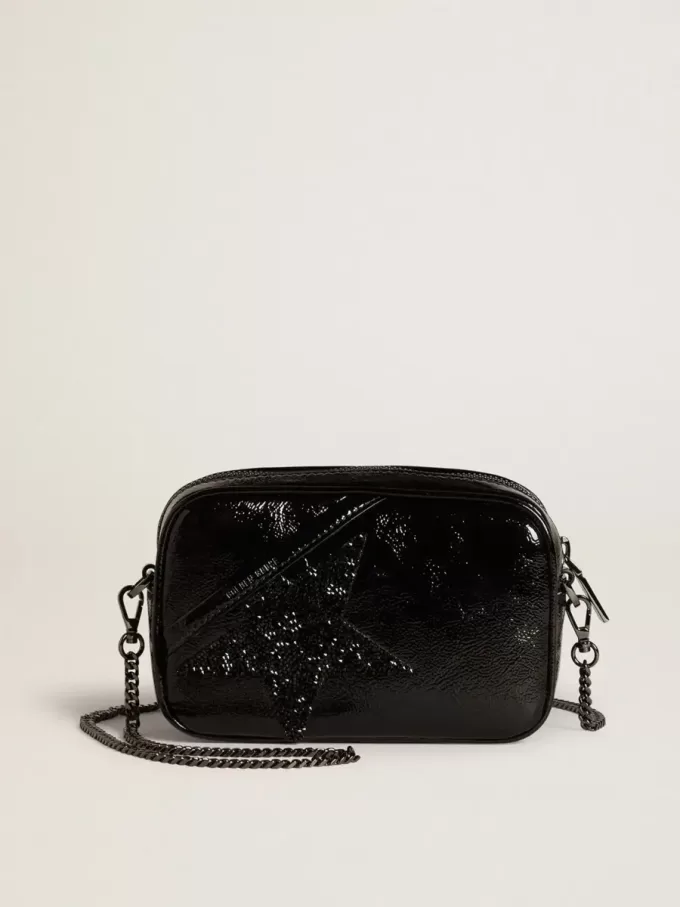 Mini Star Bag aus schwarzem Leder mit Swarovski-Kristallstern