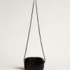 Mini Star Bag aus schwarzem Leder mit Swarovski-Kristallstern