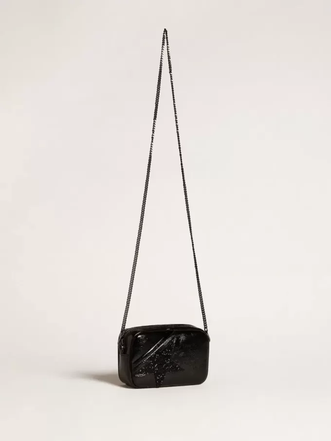 Mini Star Bag aus schwarzem Leder mit Swarovski-Kristallstern
