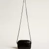 Mini Star Bag aus schwarzem Leder mit Swarovski-Kristallstern