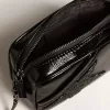 Mini Star Bag aus schwarzem Leder mit Swarovski-Kristallstern