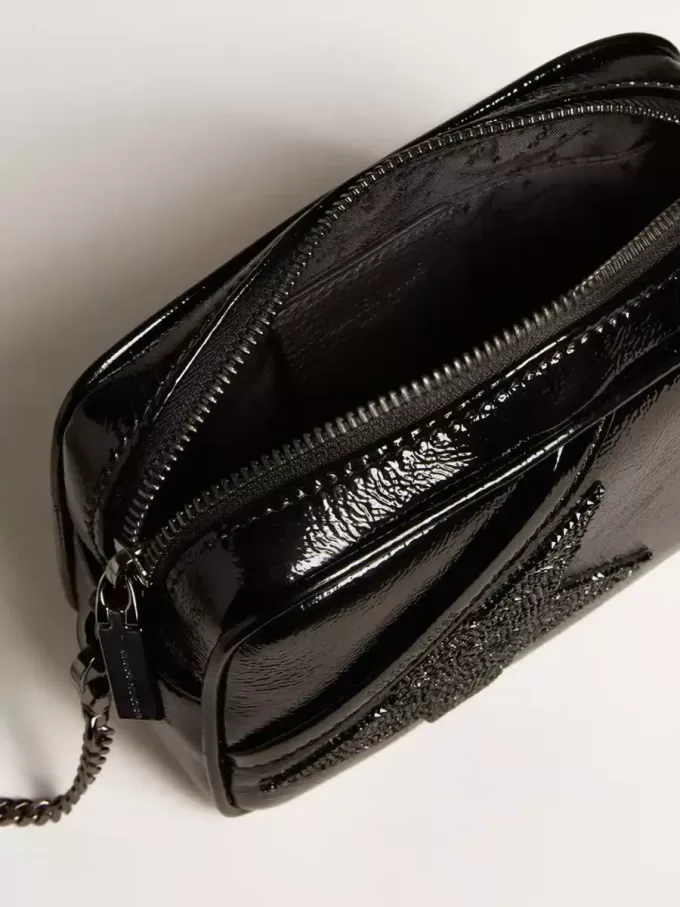 Mini Star Bag aus schwarzem Leder mit Swarovski-Kristallstern