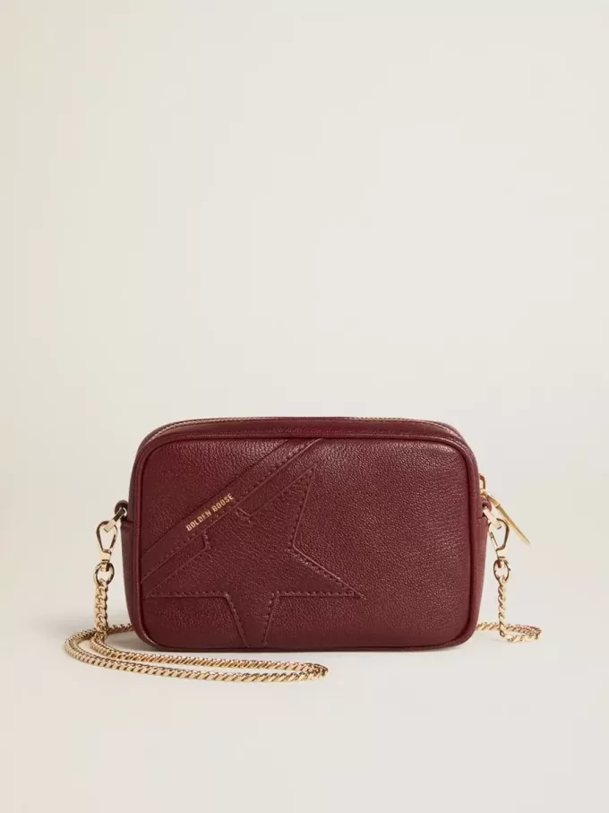 Mini Star Bag aus weinrotem Leder mit farblich abgestimmtem Stern