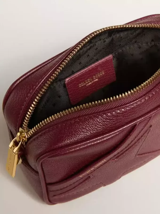 Mini Star Bag aus weinrotem Leder mit farblich abgestimmtem Stern