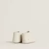 New Born Sneakers aus weißem Leder mit perforiertem Stern