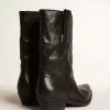 Niedrige Wish Star-Stiefel aus schwarzem Leder mit schwarzem Stern Niedrige Wish Star-Stiefel aus schwarzem Leder mit schwarzem Stern