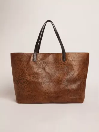 Pasadena-Tasche aus gehämmertem Leder mit Leopardenmuster und kontrastierenden schwarzen Griffen