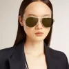 Pilotenbrille mit silbernem Rahmen und grünen Gläsern