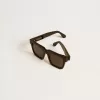 Quadratische Jamie-Sonnenbrille mit schwarzem Rahmen und goldenem Logo