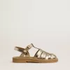 Sandalen „Young Maxime” aus goldfarbenem Metallic-Leder