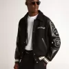 Schwarze Bomberjacke aus Wolle mit Aufnäher