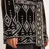 Schwarze Damenstrickjacke mit Gürtel und Kristallen Schwarze Damenstrickjacke mit Gürtel und Kristallen