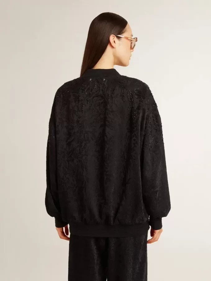 Schwarze Damenstrickjacke mit Ton-in-Ton-Perlenstickerei im Toile-de-Jouy-Muster