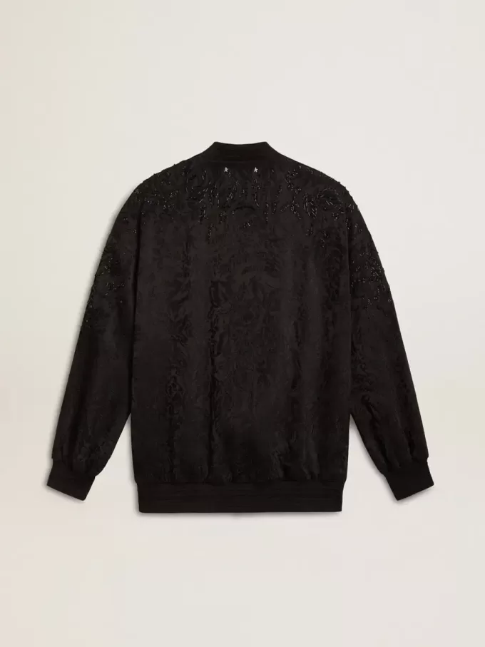 Schwarze Damenstrickjacke mit Ton-in-Ton-Perlenstickerei im Toile-de-Jouy-Muster