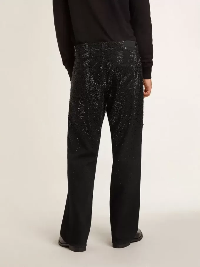 Schwarze Herrenjeans mit lockerer Passform und Kristallen mit Farbverlaufseffekt