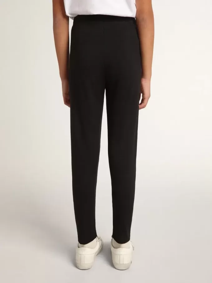 Schwarze Leggings für Mädchen mit weißen Sternen an den Seiten