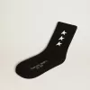 Schwarze Socken mit kontrastierenden weißen Sternen