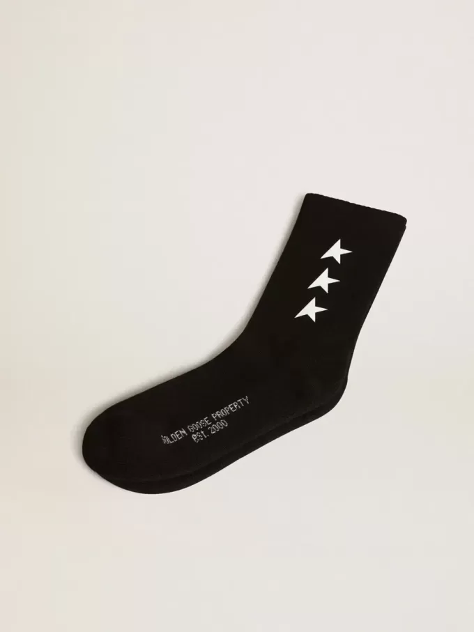 Schwarze Socken mit kontrastierenden weißen Sternen