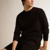 Schwarzes Sweatshirt aus der Archibald Star Collection mit ton-in-ton Stern auf der Vorderseite