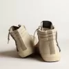 Slide aus beigem Mesh und Nylon mit blauem Lederstern und Blitz