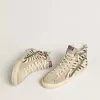 Slide-Sneaker für Damen aus Ponyfell mit Zebradruck und grünem Laminatleder-Detail
